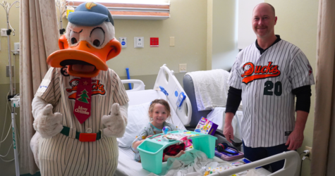 DUCKS DELIVER HOLIDAY GIFTS TO CHILDREN AT LOCAL HOSPITALS