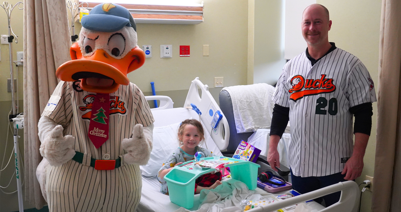 DUCKS DELIVER HOLIDAY GIFTS TO CHILDREN AT LOCAL HOSPITALS