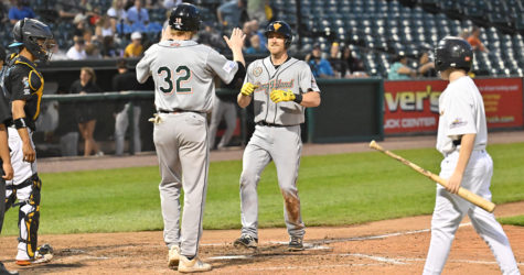 LONG ISLAND USES HOMER BARRAGE TO BLAST PAST YORK