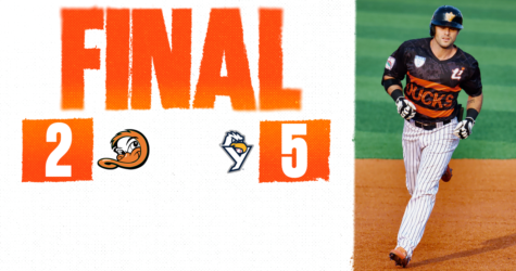 REVOLUTION HANG ON LATE TO DEFEAT DUCKS